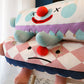 Clown Sleeps In A Cozy Pet Bed - Paws Claw Snawws